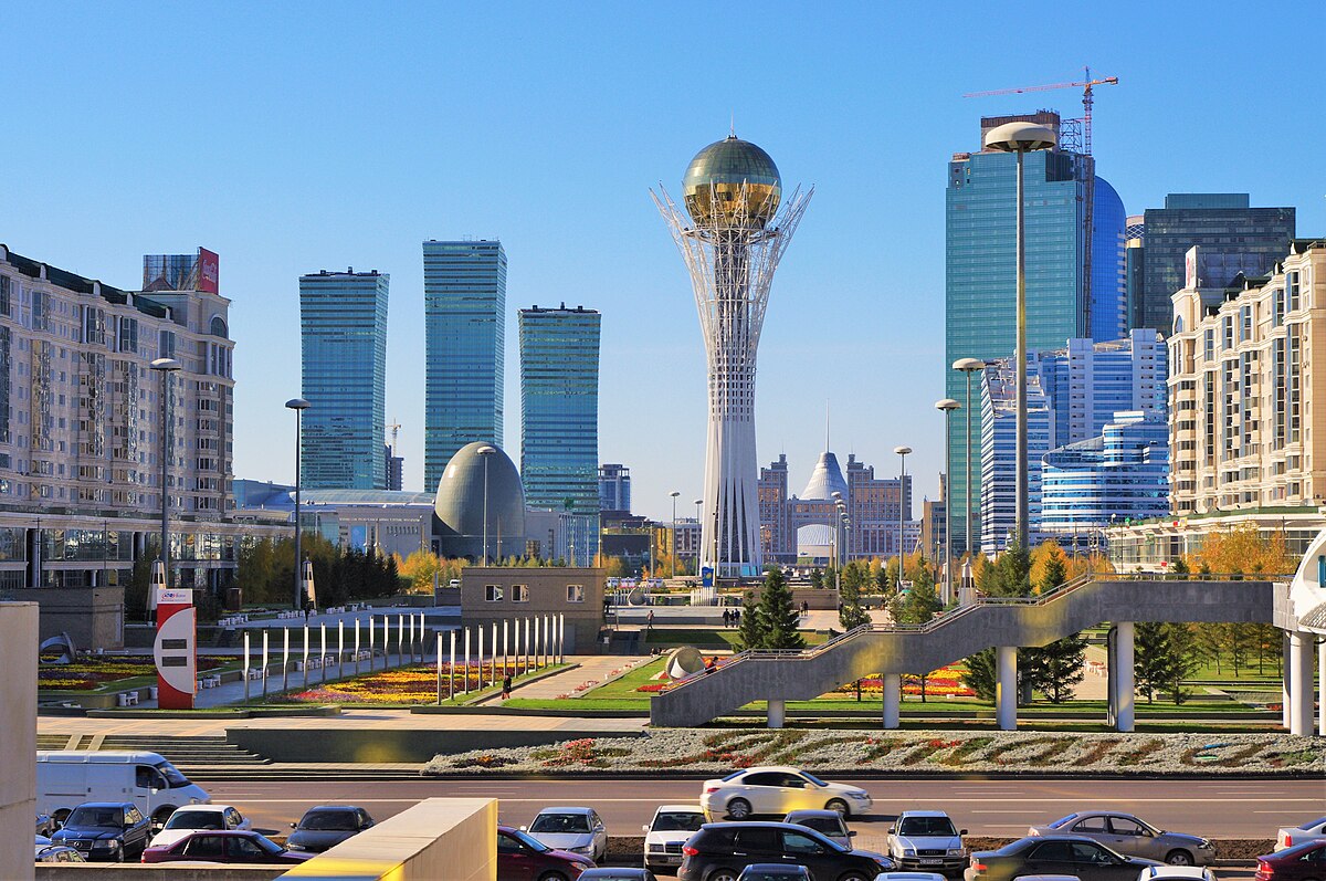 The futuristic Bayterek Tower in Astana, glowing at twilight