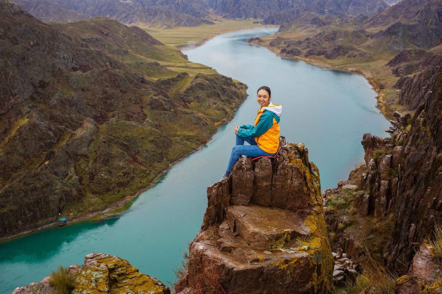Girl On The Cliff In Almaty Canyon
